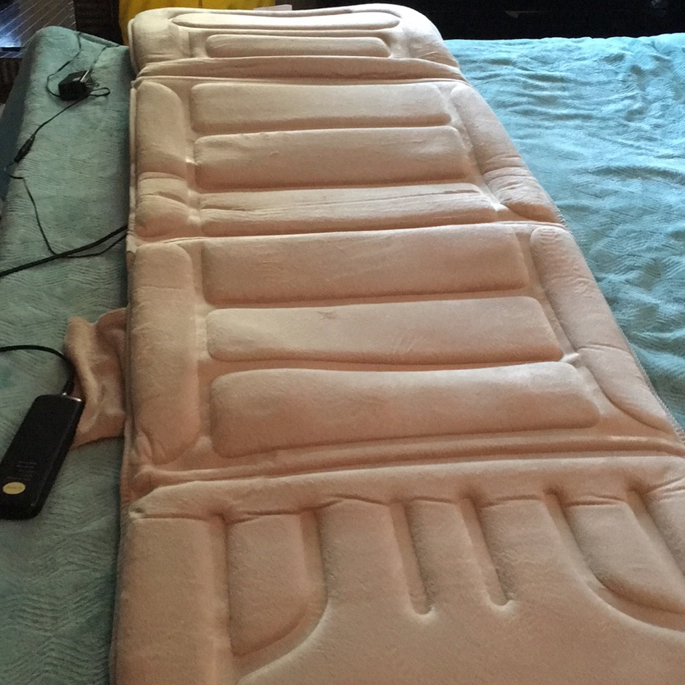 Heated massage pad